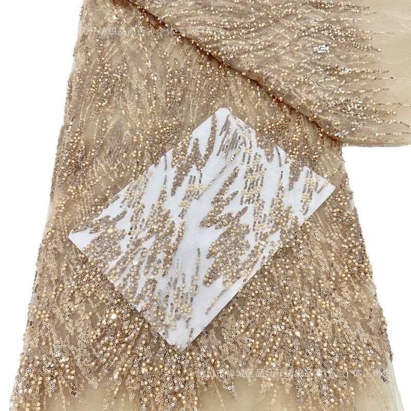 Tejido de bordado de perlas de bollo de moda Gao Ding vestido de boda cena escenario vestido vestido de tela