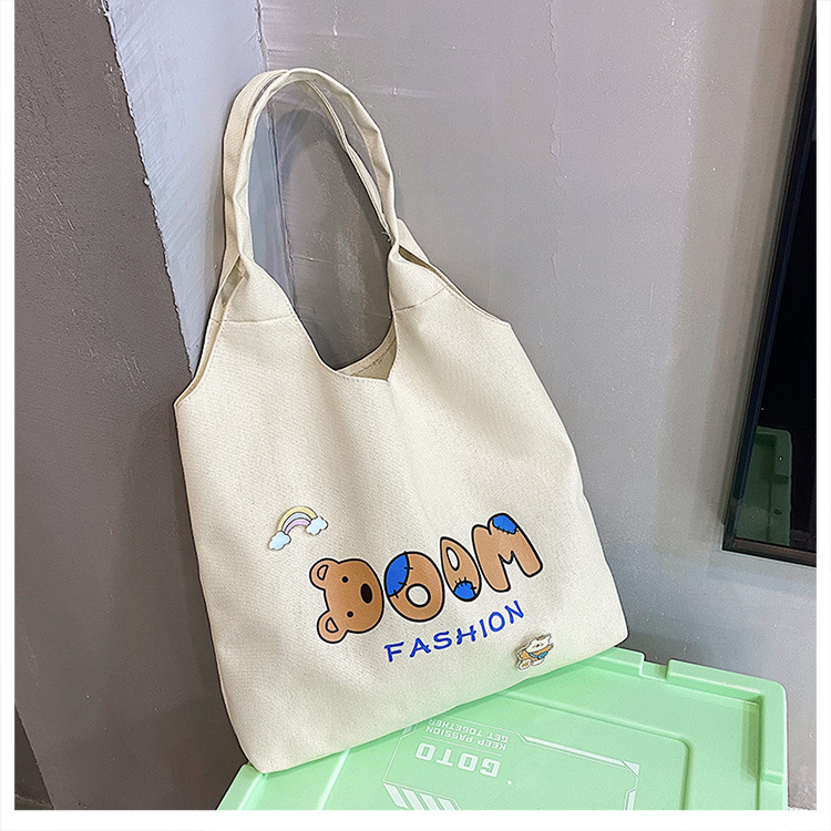 2021 Summer Japanese-style simple canvas bag, student backpack, single-shoulder handbag for going out, cartoon badge cotton bag undefined