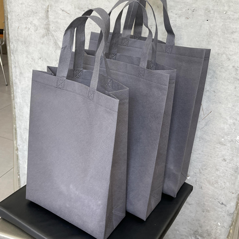 Bolsa de tela no tejida vertical gris, bolsas de regalo para tiendas de ropa LOGO