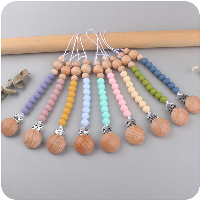 Nuevo bebé haya clip calmante bebé cuentas de silicona morder pegamento molar pezón cadena anti-caída cadena AliExpress