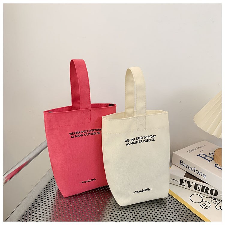 Amazon suministro transfronterizo/INS estilo hervidor de agua bolso de color sólido mini bolso Portátil Bolsa de lona bolso de la momia femenina