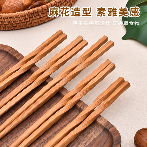 Manufacturer of bamboo tableware for home use and hotel bamboo Japanese-style pointed chopsticks carbonized chopsticks 24cm twist bamboo chopsticks