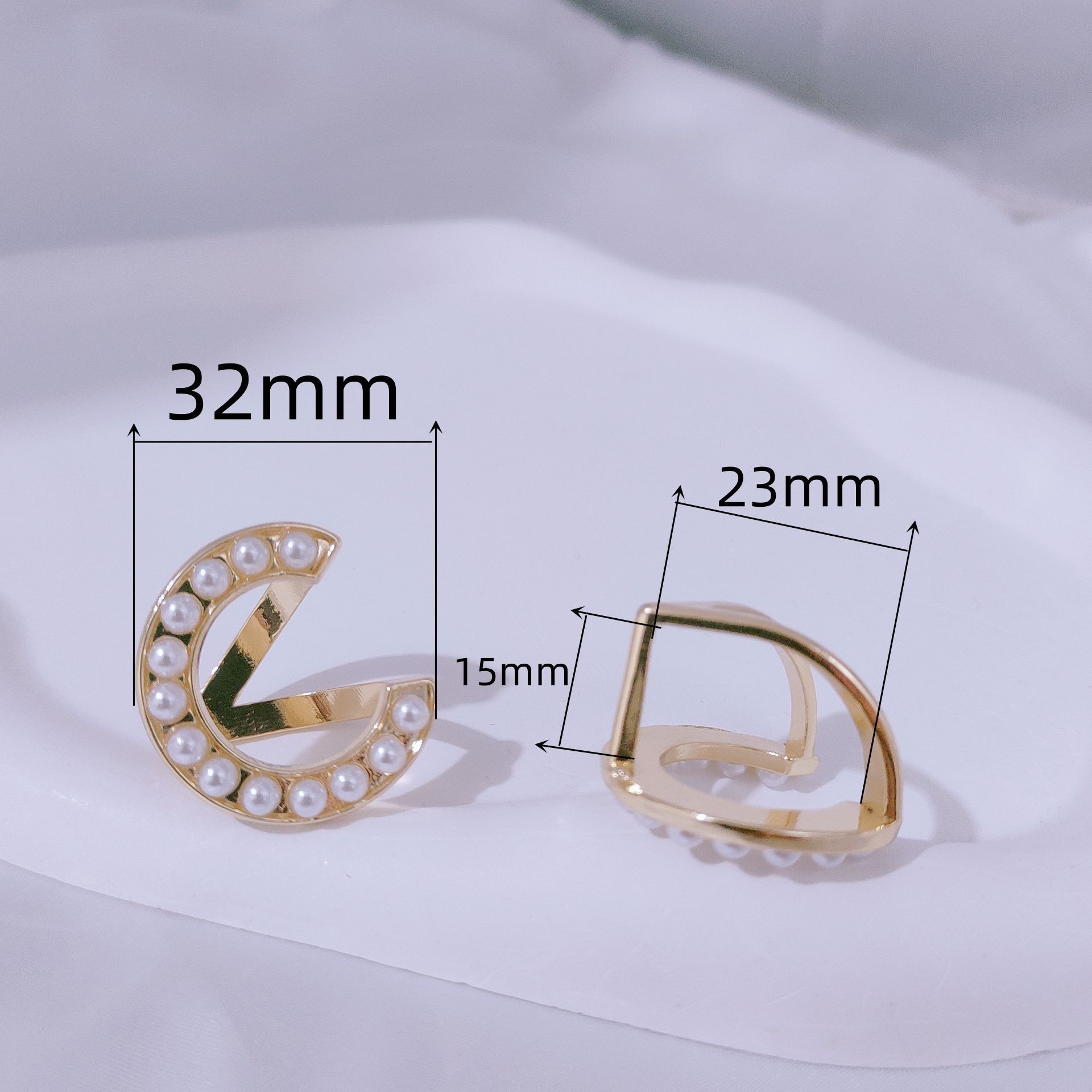 Corea del Sur multi-funcional bufanda hebilla de alta calidad perla moda nueva Camelia windbreaker cinturón hebilla de alta gama joyería al por mayor