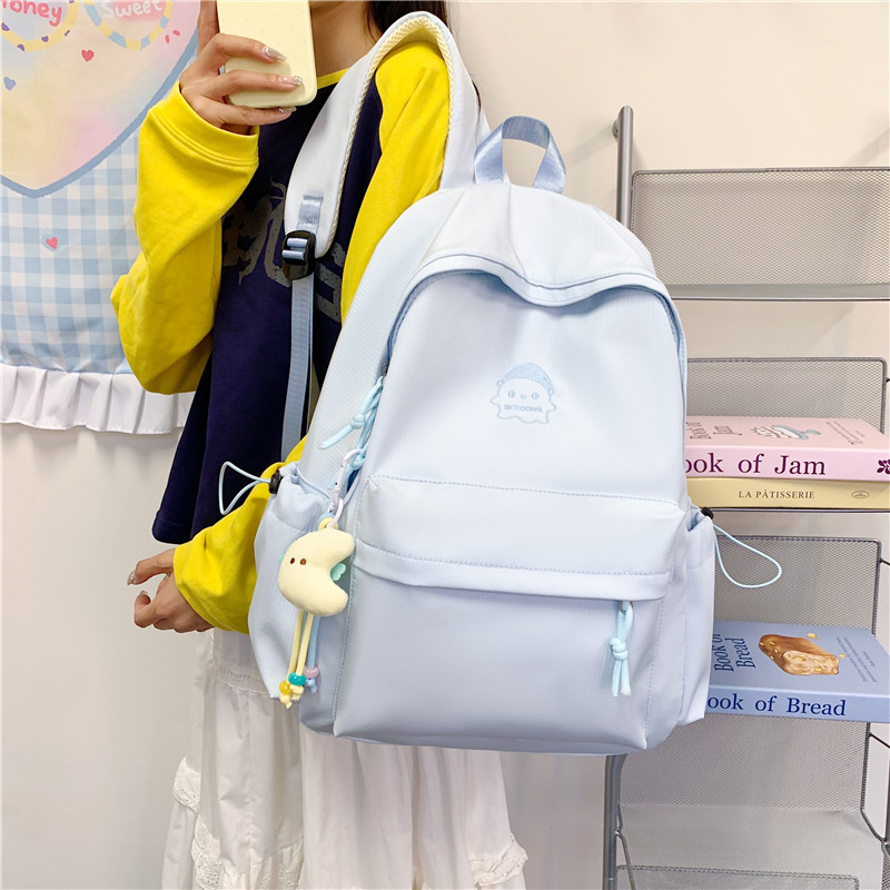 书包女中学生简约百搭双肩包女生小清新潮流高中生学院风帆布背包