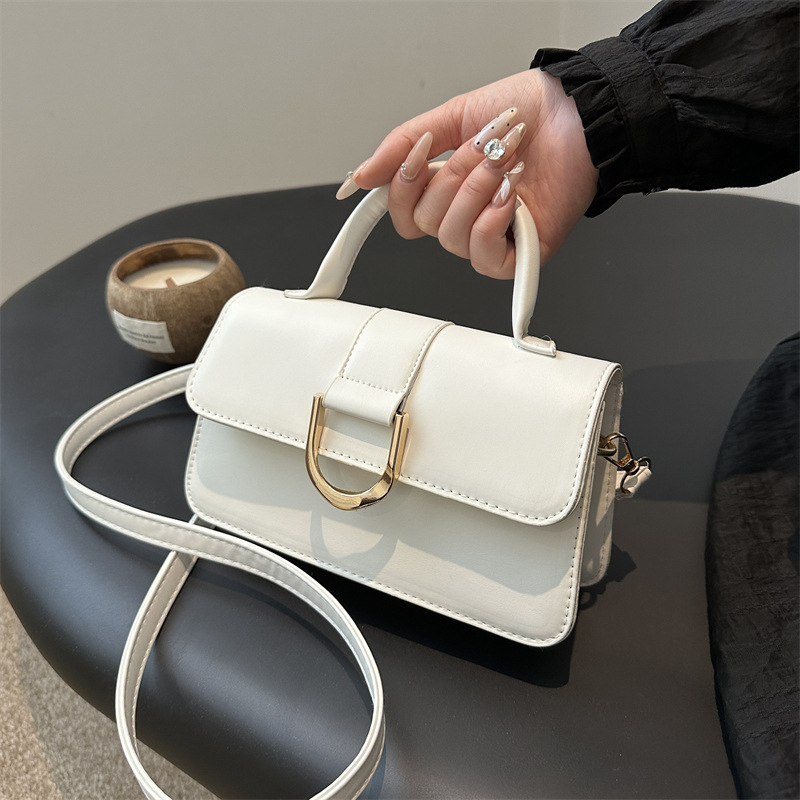 Bolso popular de este año para mujeres 2024, nuevo bolso de mano de textura de moda, bolso de viaje, bolso de hombro, bolso pequeño