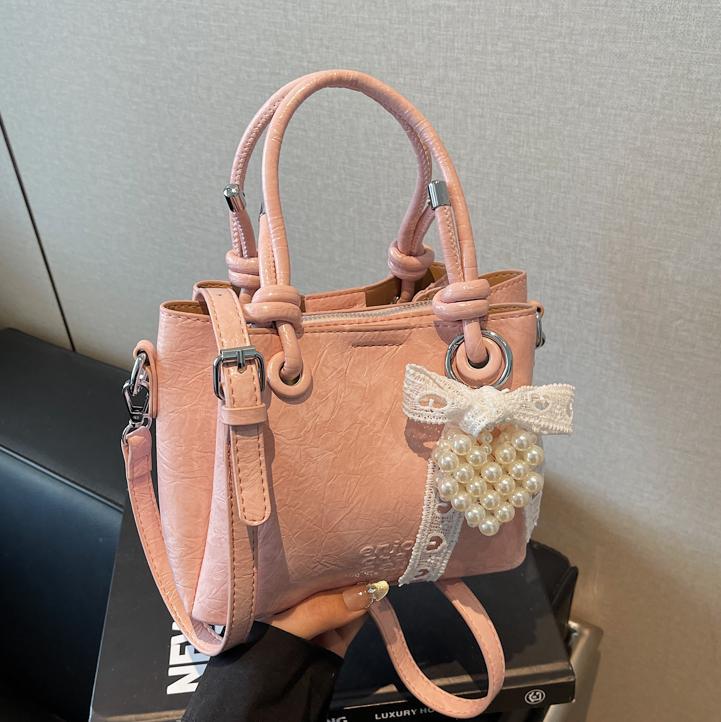Bolso de mano de tendencia de comercio exterior femenino 2025 nuevo estilo plisado todo-fósforo bolso de hombro retro de alta gama ocio cubo bolso