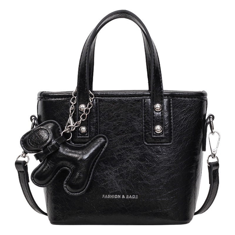 Bolso popular de este año para mujeres 2025, nuevo paquete de cubo de textura transfronteriza de alta calidad, moda versátil bolso de mochila superfuego