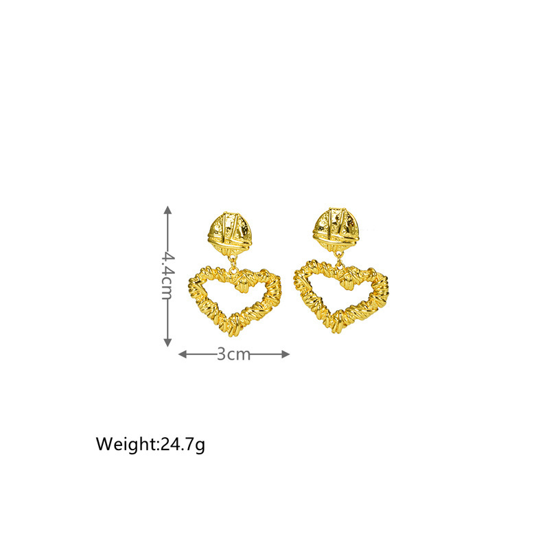 Vintage Solid Color Hollow Heart Shaped Fold Irregular Copper Earring Wholesale display picture 2