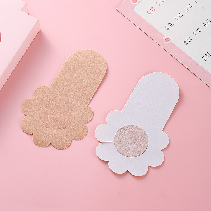 Parche de pecho de elevación de tela no tejida desechable antiluz en forma de flor circular en forma de flor en forma de cruz Parche de pecho invisible en forma de flor anticonvexa