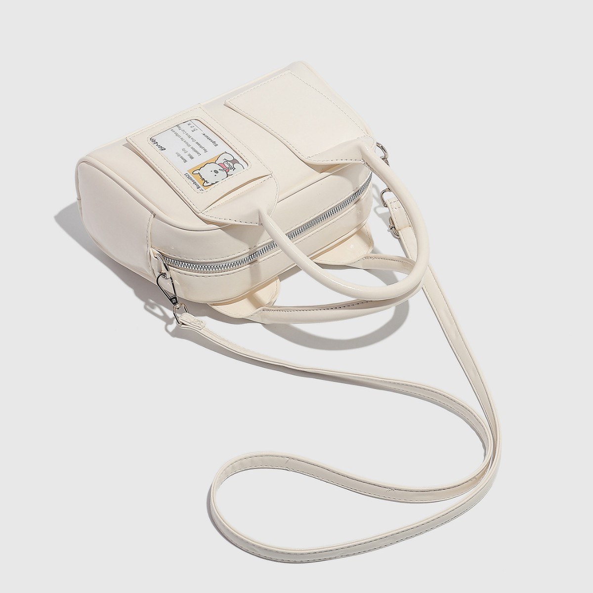 Bolsa de boliche feminina de alta qualidade e estilo moderno, com alça transversal e fecho de zíper em couro PU multicolorido._voghion.com