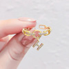 Golden ring, chain, fashionable brand pendant with letters, European style, on index finger, internet celebrity