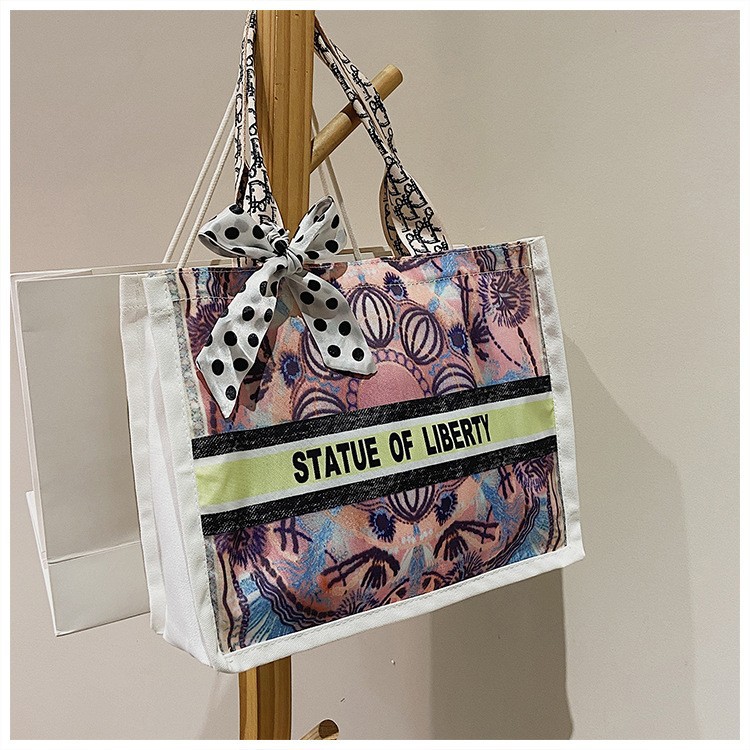 Bolsa de hombro de lona de gran capacidad bufanda de seda casual de mujer nueva moda bolsa de compras estudiante cubo Portátil Bolsa de maquillaje cuadrado