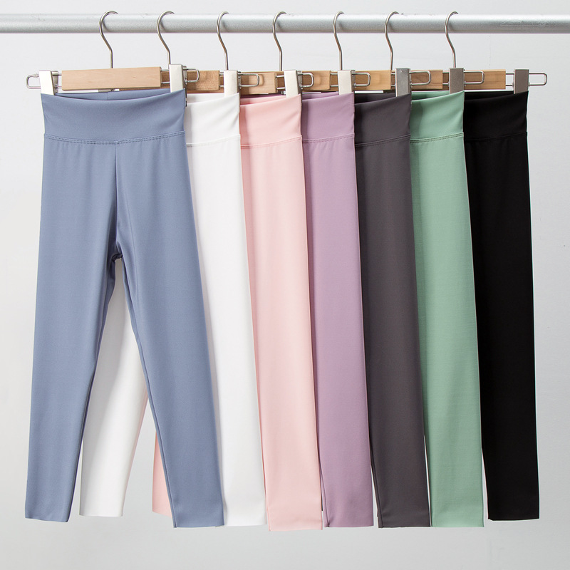 Pantalones de tiburón para niñas primavera y otoño ropa de bebé delgada Pantalones deportivos de corte casual niños medianos y grandes estiran pantalones de yoga fabricante