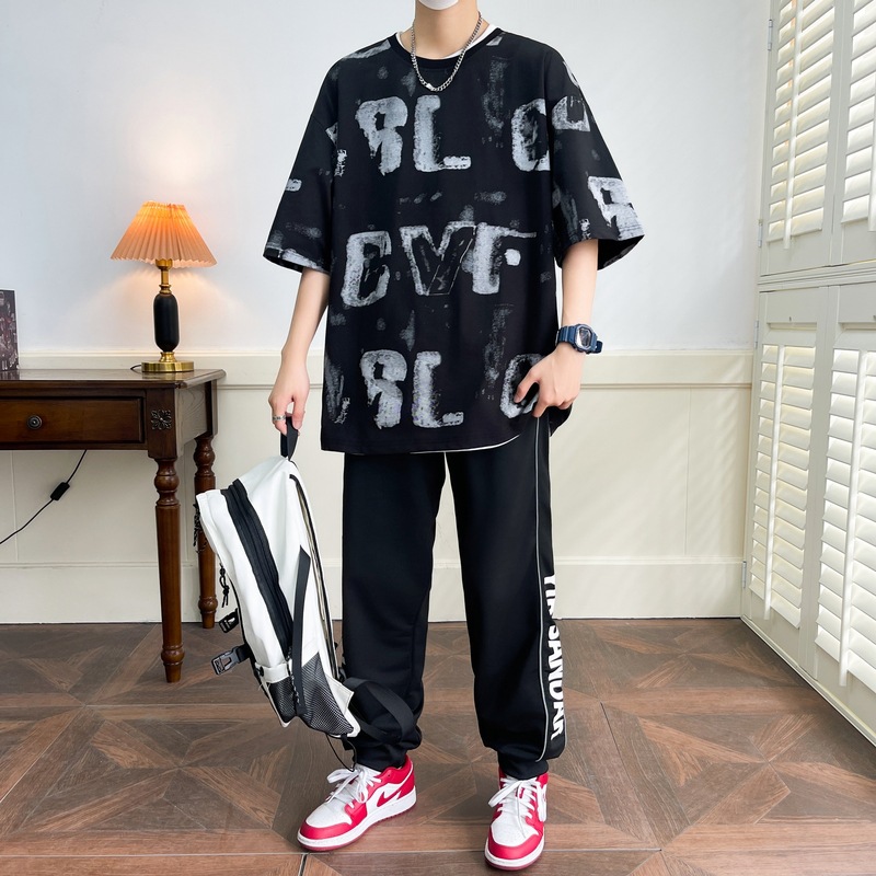 Set de verano de manga corta para hombres de moda de media manga suelta de moda impresa completa camiseta pantalones de dos piezas de moda universal