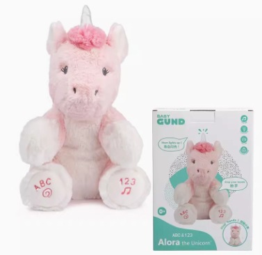 アメリカのbaby gundの誕生日熊熊の誕生日おめでとう歌はろうそくを吹いて赤ちゃんの子供のぬいぐるみをなだめる