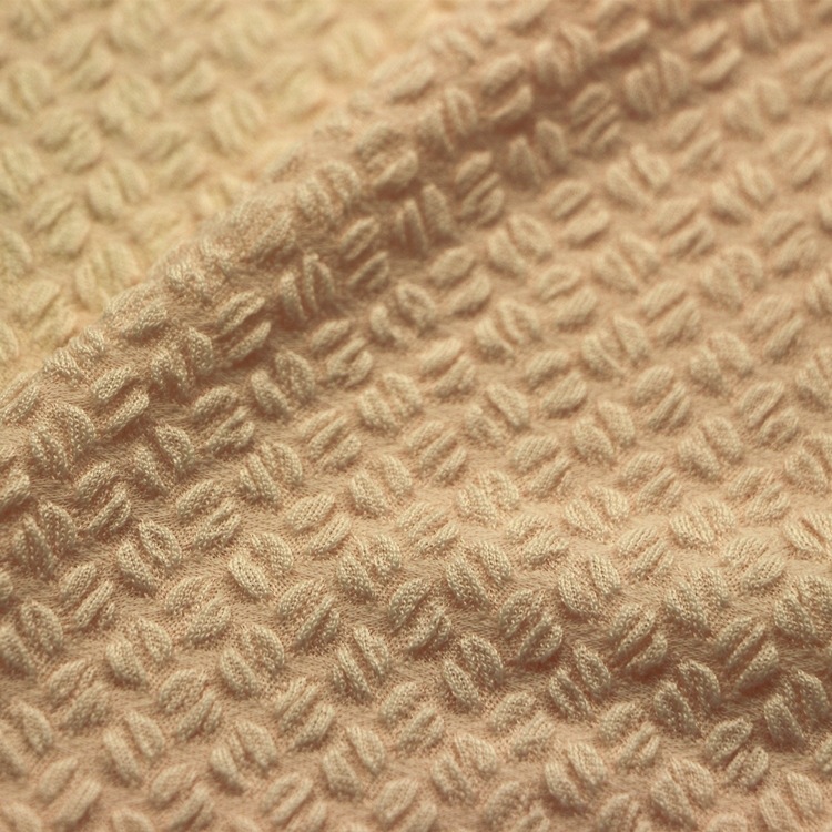 提花咖啡豆单面布汗布服装面料针织纬编全涤氨纶起皱泡泡单面布料