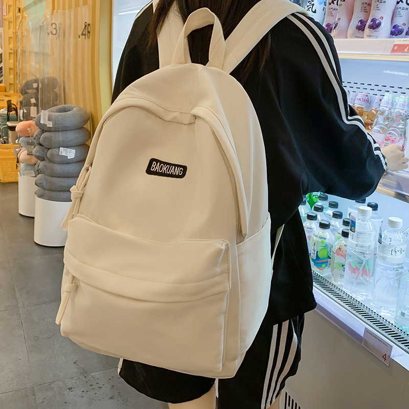 纯色原创日本小众双肩包大学生高中生背包简约百搭休闲韩版书包