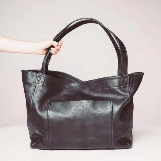 Dames handtas van vintage geolied leer met schouderriem_voghion.com