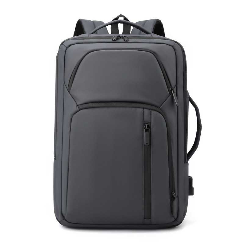 Nueva película de cuero mochila a prueba de derrames USB recargable de gran capacidad mochila de viaje de moda simple bolso de computadora para hombres