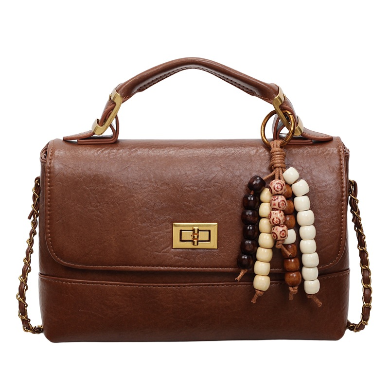 Cross-border 2025 otoño y invierno nuevo bolso de mano de alta calidad bolso cuadrado pequeño de textura de mujer bolso de hombro nicho bolso de mochila
