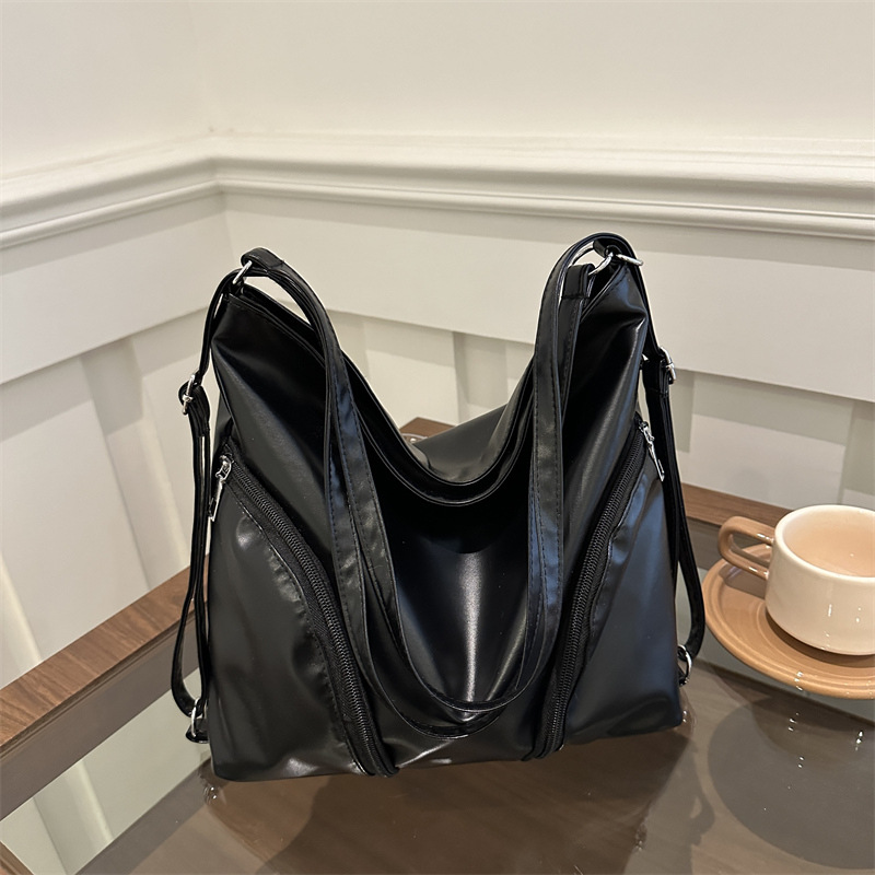 Bolso de mujer de cuero blando 2024 nueva mochila de gran capacidad de transporte de moda mochila simple ocio de moda tote