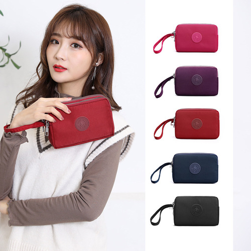 厂家批发跨境新款女士零钱手机包三层拉链横款手拿包好质量手挽包