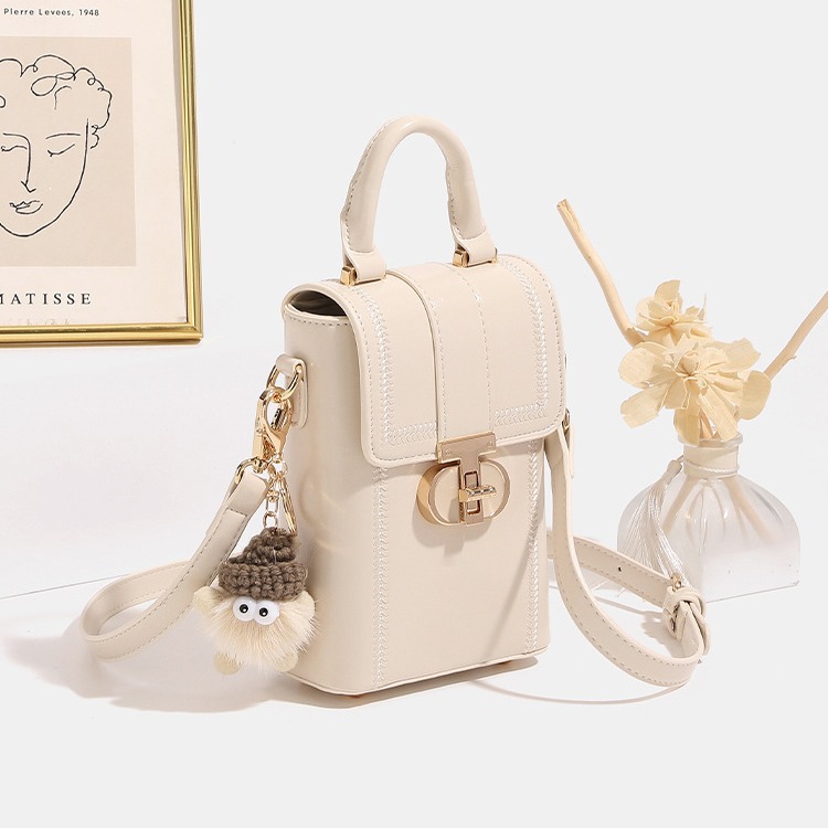 Agente de compras en Hong Kong, mini bolso de mano para mujer, nuevo bolso de mano de alta gama 2025, bolso cruzado versátil para teléfono