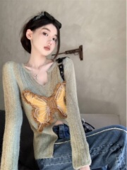 Vネックのスリムな長袖のギャルの開叉のニットの女性の秋の新型の蝶のデザイン感が見えます。