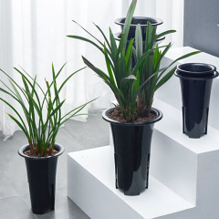 Black, breathable orchid pot with side vents—specialized for Cymbidium orchids, made from imitation purple sand-style plastic, extra-thick design, and available in high-waisted version for wholesale.