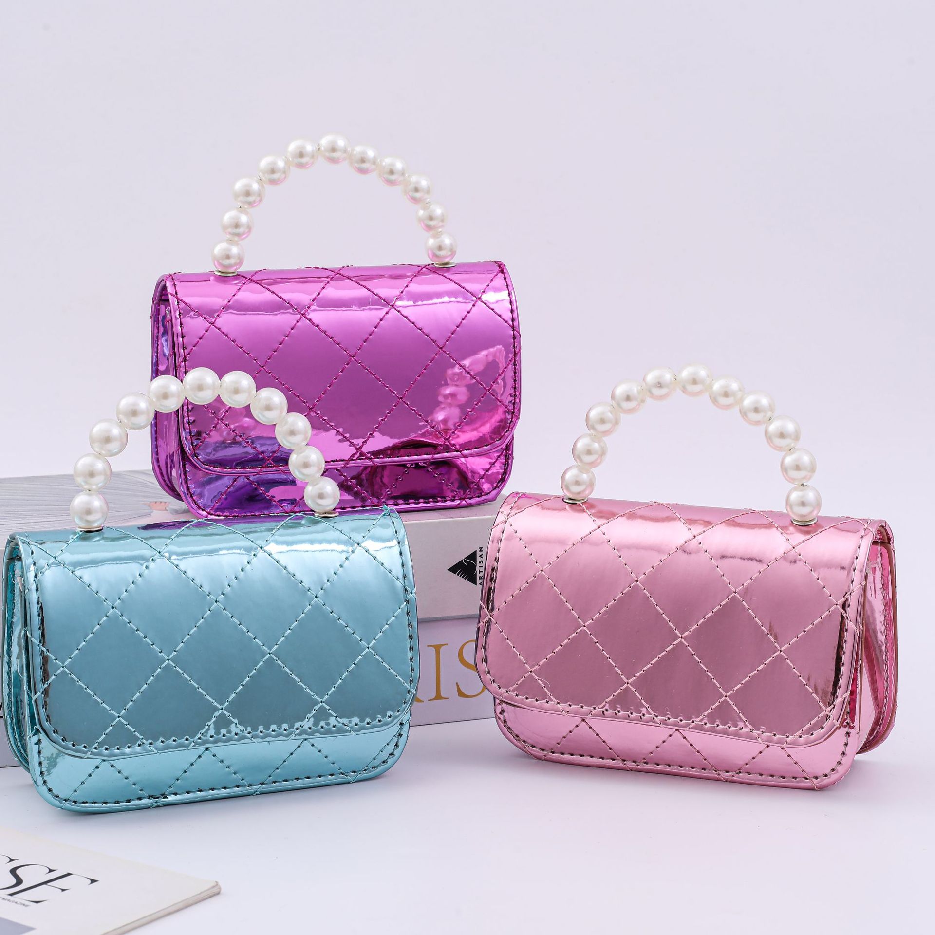 Nuevo cross-border Lingerie PU bolso de perla hermoso bolso de princesa universal bolso de moda bolso de cambio al por mayor
