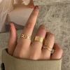 Golden metal retro fashionable ring with pigtail, on index finger, European style, simple and elegant design