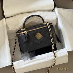 包包女2025新款手柄长盒子荔枝纹牛皮单肩斜跨鱼子酱化妆包时尚女