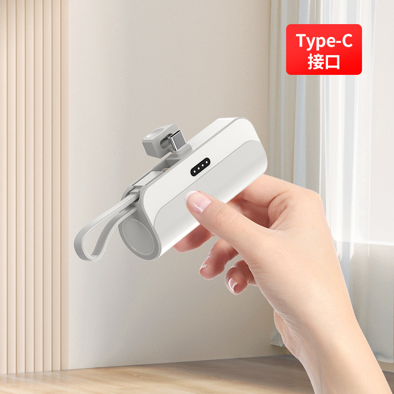 Creativa mini cápsula inalámbrica tesoro de carga al por mayor soporte portátil bolsillo de emergencia carga rápida fuente de alimentación móvil transfronteriza