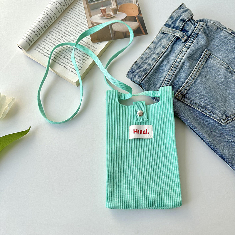 Primavera nuevo color sólido de punto de hombro mochila bolso móvil de moda versátil bolso de dopamina para hombres y mujeres