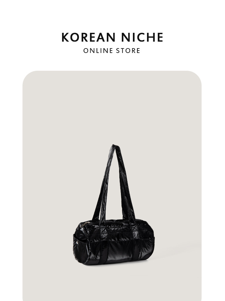 Corea del Sur nicho 2024 otoño e invierno nuevo estilo ligero y moderno bolso cilíndrico de un solo hombro todo fósforo simple bolso de axila mujer