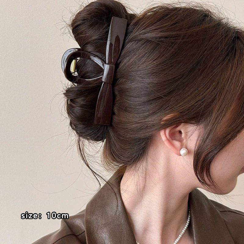 Chocolate-colored off-the-shoulder top with a bow