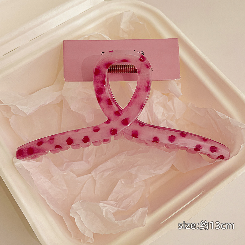 Raspberry polka dot crossover