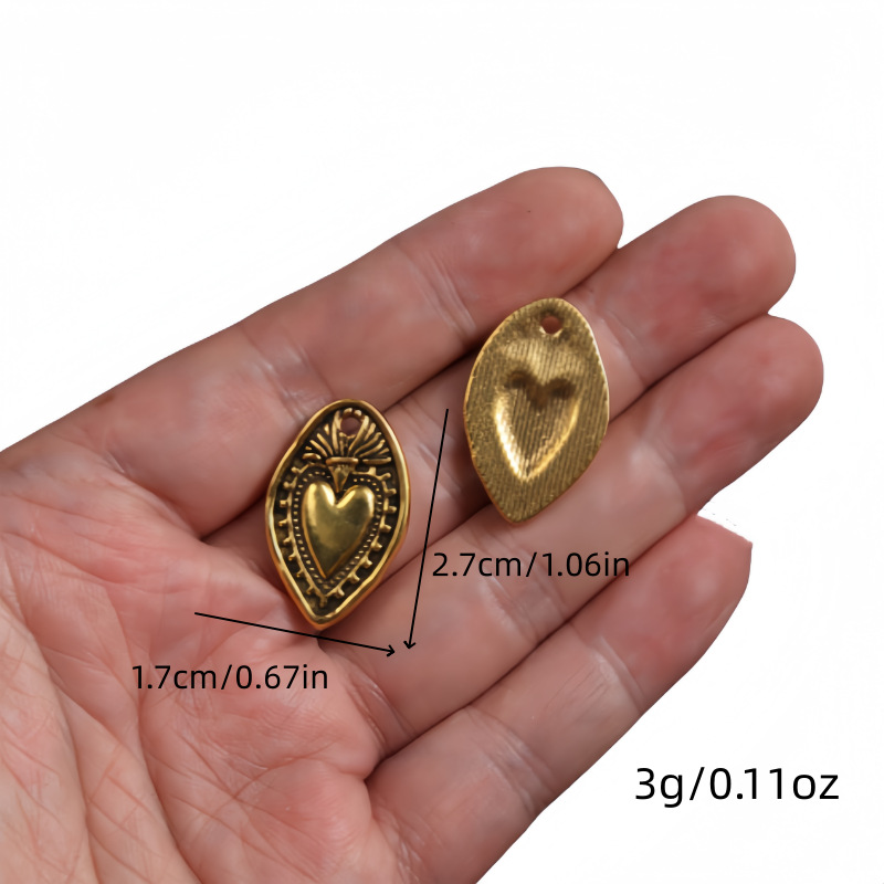 Transfronterizos 10 estilos de oro antiguo colorado colgante de aleación del corazón sagrado DIY encanto joyería accesorios metálicos