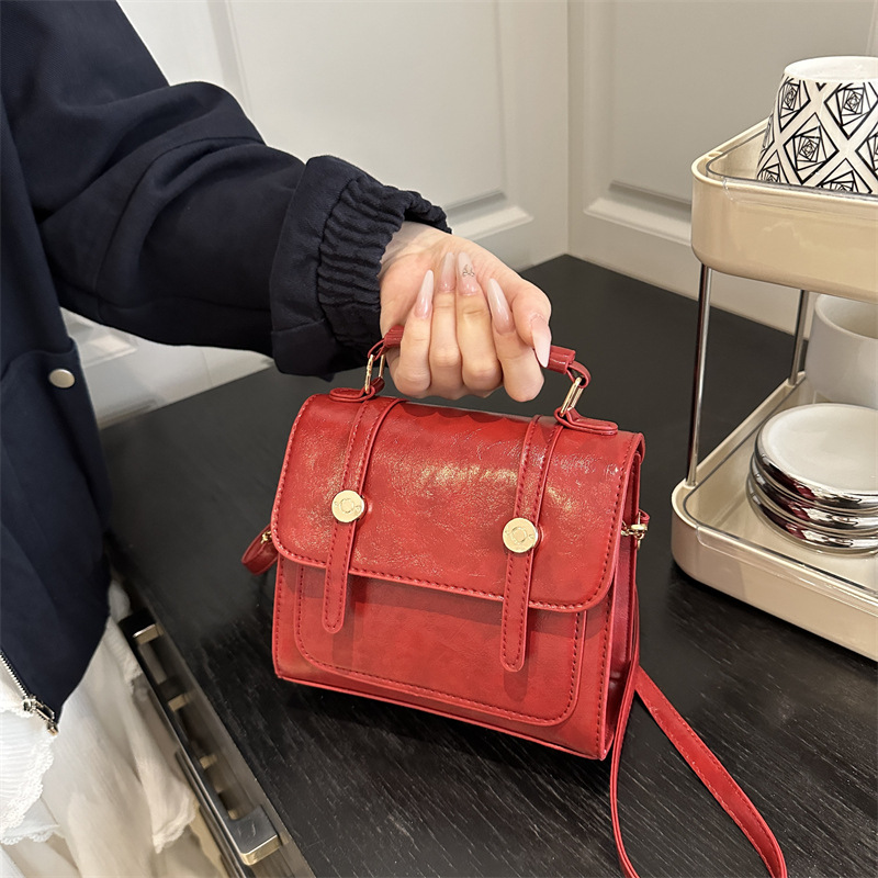 Retro Maillard British College Style Bolso mujer 2025 nuevo bolso de mensajero textura portátil Cambridge pequeño bolso cuadrado marea