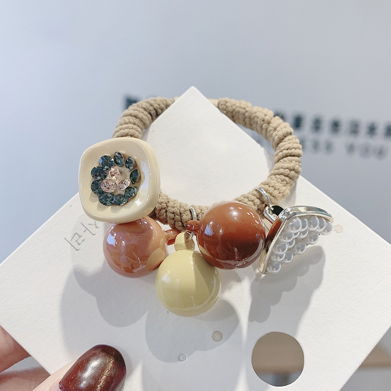 Yellow candy ball hair rope