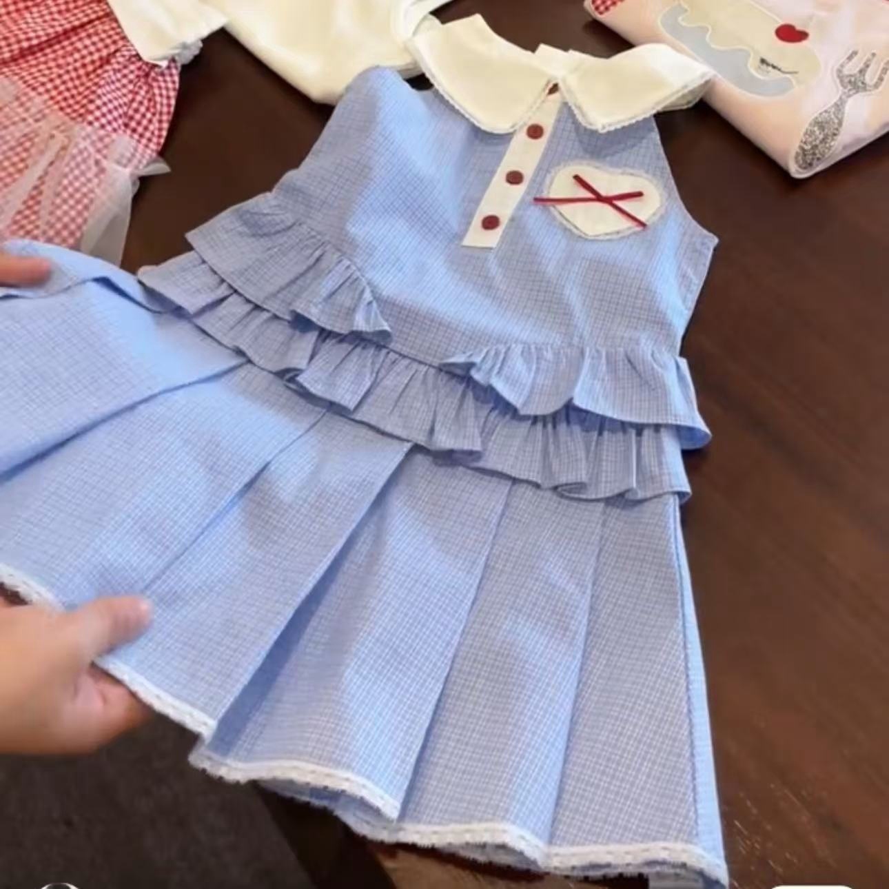 Qian Qi ropa infantil vestidos de niñas lindos verano 25 nuevos dulces bebés chalecos a cuadros azul claro
