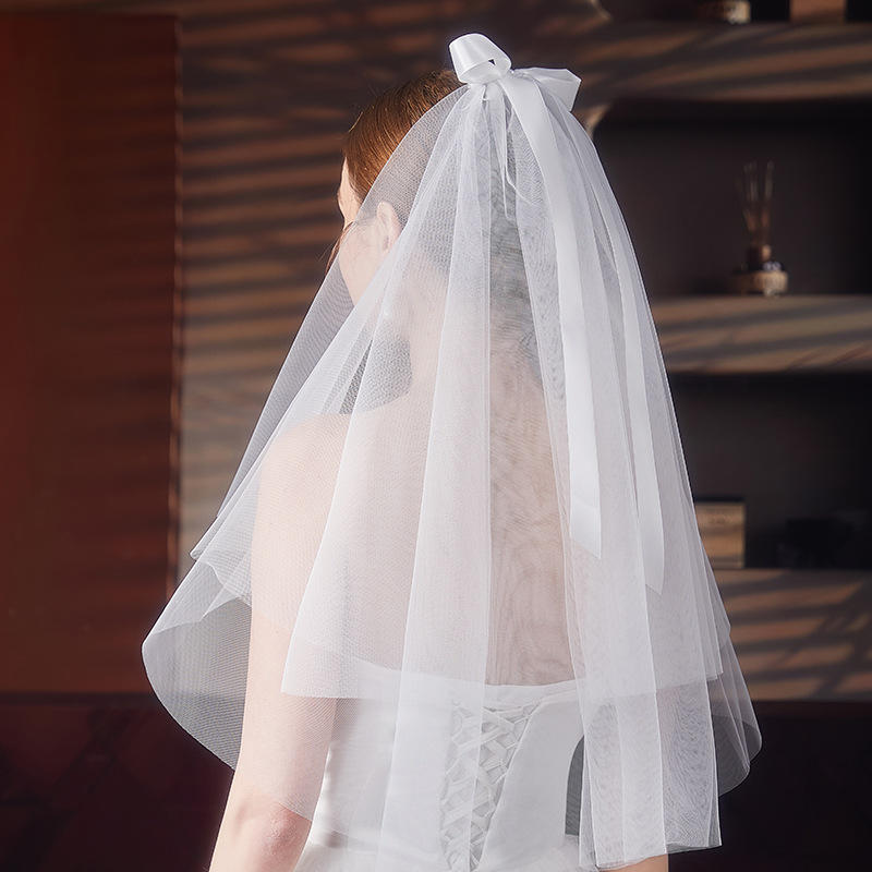 Short wedding dress with bow
