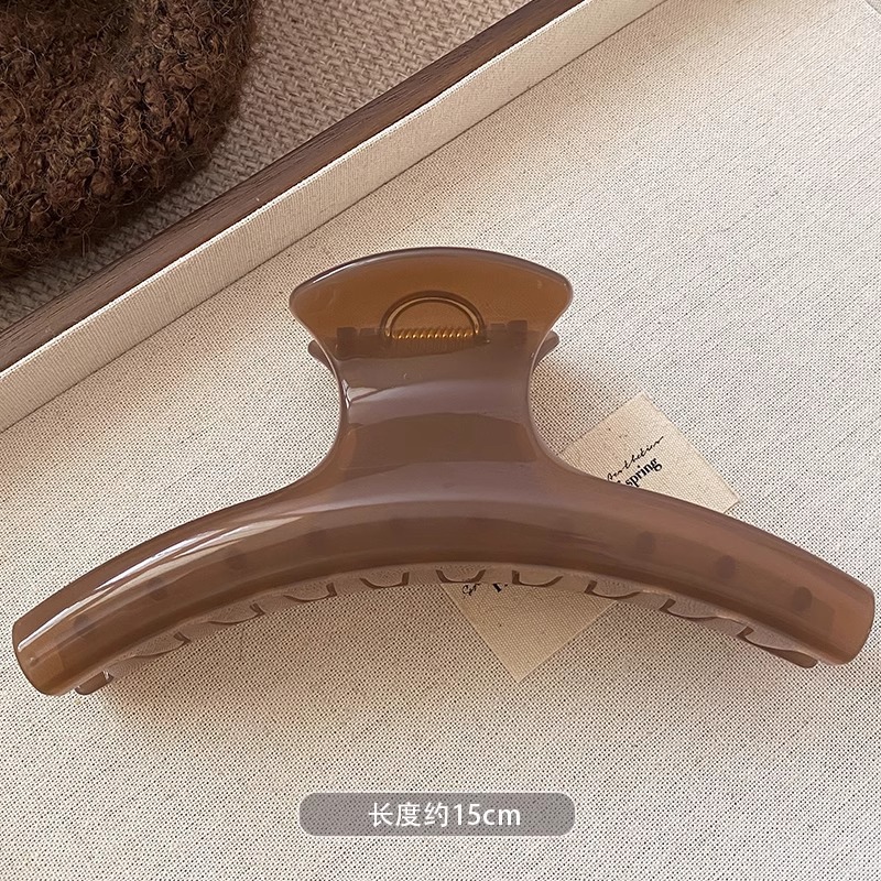 5 ¿ marrón lino de unos 15 cm