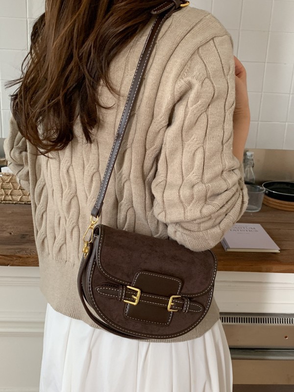Bolsa de silla de mano exterior de color combinado para mujeres 2025 nueva moda universal nicho retro bolso de hombro