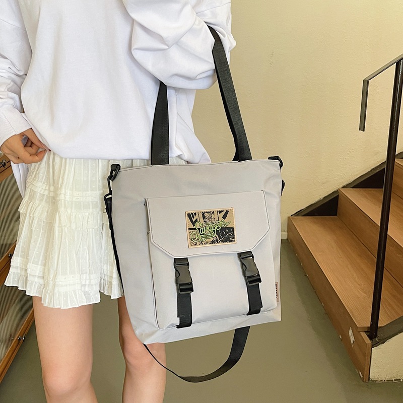 Cross-border 2024 nueva bolsa de estudiantes de gran capacidad de moda textura mochila de hombro bolsa de compras bolsa de mano