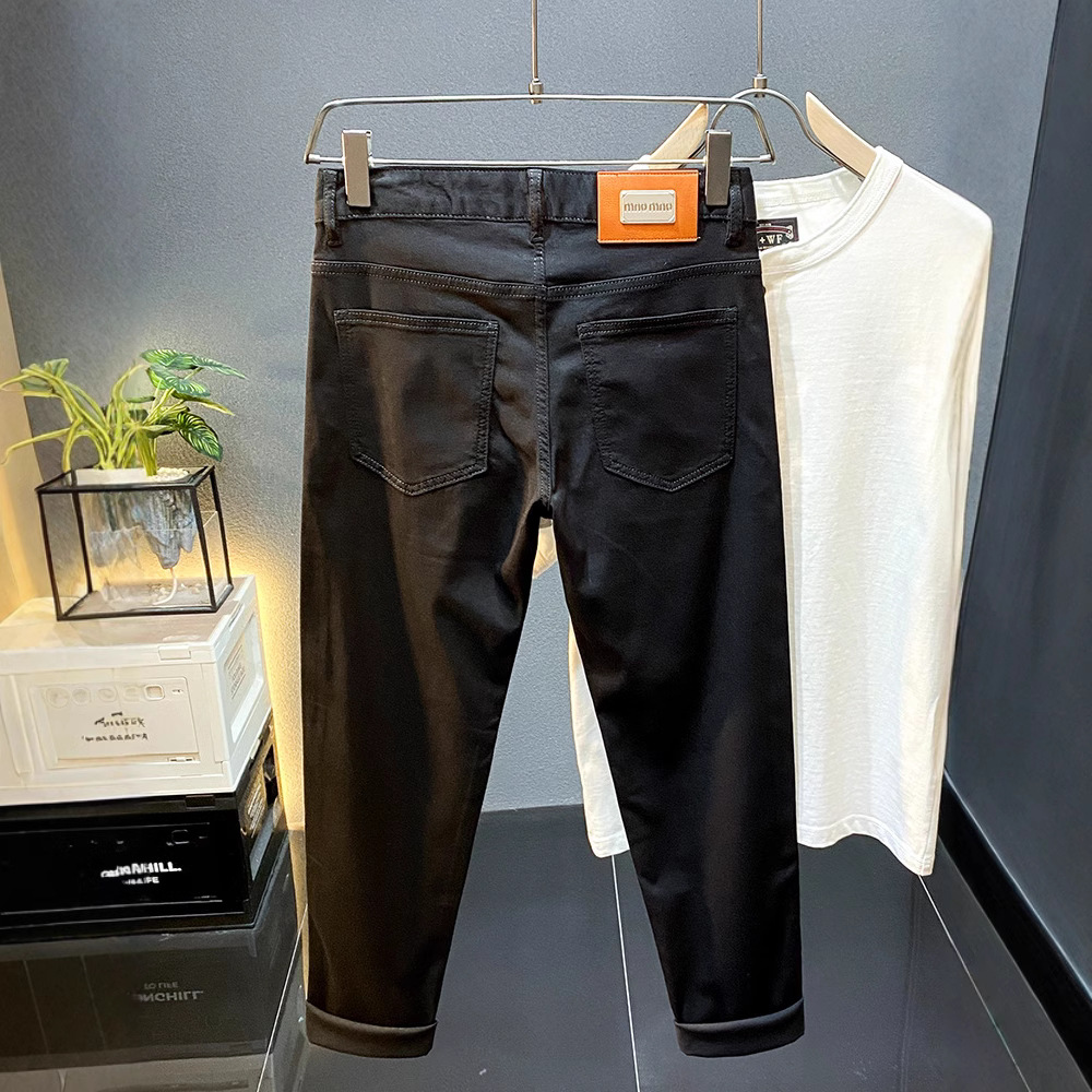 High-end Lesel verano delgado puro negro jeans hombre delgado pie pequeño pantalones americanos de calzado de calzado
