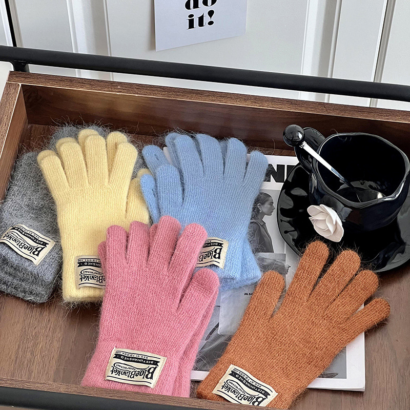 Guantes de invierno caliente estilo coreano de color sólido versátil guantes de lana de punto para mujeres a prueba de viento pantalla táctil guantes de dedos al por mayor