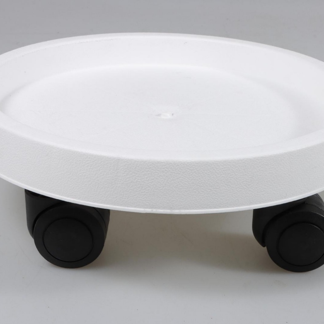Suministro directo de fábrica de soportes para macetas con ruedas, base redonda de plástico grueso con ruedas, soporte universal móvil con ruedas, venta al por mayor.