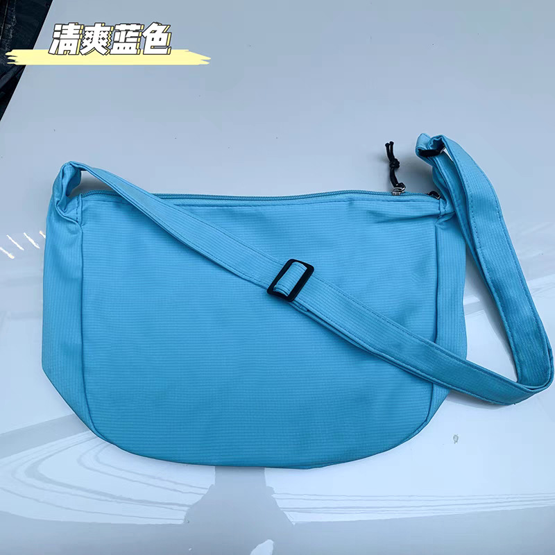 Estilo coreano versátil estudiante ins japonés Harajuku simple waffle artístico hombro color sólido mensajero bolsa dumpling bolsa