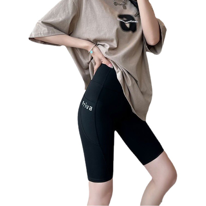 Verano delgado de cinco puntos pantalones de tiburón desgaste exterior de las mujeres bolsillo pantalones cortos vientre contracción cadera levantamiento Barbie polainas de las mujeres